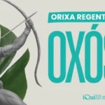 O Orixá regente de 2026 é Oxóssi: sabedoria, proteção e prosperidade Imagem de Oxóssi apontando seu arco, com penas e folhas. Na imagem, lemos que ele é o Orixá regente de 2026