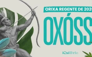O Orixá regente de 2026 é Oxóssi: sabedoria, proteção e prosperidade Imagem de Oxóssi apontando seu arco, com penas e folhas. Na imagem, lemos que ele é o Orixá regente de 2026